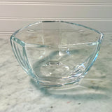 Clear glass bowl on a marble surface with a white wall background Vintage Tiffany Bowl - New York City Skyline