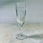 Clear glass goblet with decorative pattern on a marble surface Vintage Villeroy & Boch Miss Desiree Champagne Flutes