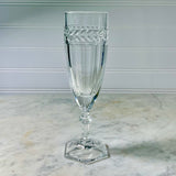 Clear glass goblet with decorative pattern on a marble surface Vintage Villeroy & Boch Miss Desiree Champagne Flutes