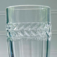 Clear glass with decorative etching on a gray background Vintage Villeroy & Boch Miss Desiree Champagne Flutes closeup