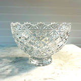 Clear glass bowl with diamond pattern on a marble surface Vintage Brussels Bowl by Crystal Clear Industries