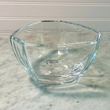 Clear glass bowl on a marble surface with a white wall background Vintage Tiffany Bowl - New York City Skyline
