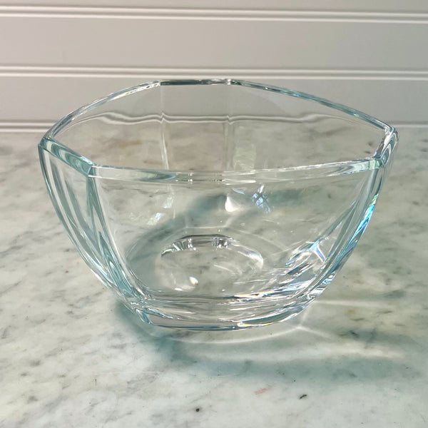 Clear glass bowl on a marble surface with a white wall background Vintage Tiffany Bowl - New York City Skyline