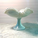 Milk glass compote with scalloped edge on a marble surface Vintage Footed Square Silver Crest Bowl by Fenton
