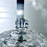 Vintage Zawiercie Laurencie Cut Glass Tall Crystal Cracker Jar with a faceted lid, shown with a metal ruler standing behind the top to indicate size against a light paneled background.
