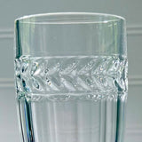 Clear glass with decorative etching on a gray background Vintage Villeroy & Boch Miss Desiree Champagne Flutes closeup